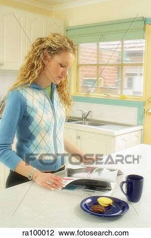 Woman in kitchen View Large Photo Image Stock Image - Woman in kitchen. Fotosearch