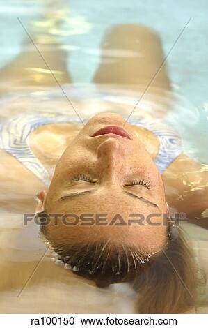 Woman in pool View Large Photo Image Stock Image - Woman in pool. Fotosearch