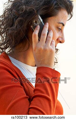 Woman on phone View Large Photo Image Stock Image - Woman on phone. Fotosearch