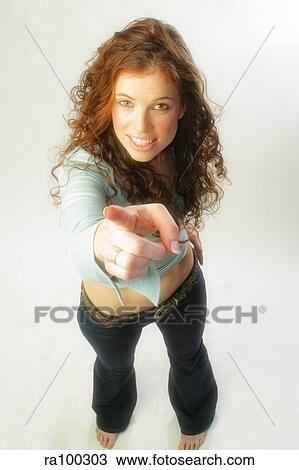 Stock Image - Woman pointing. Fotosearch