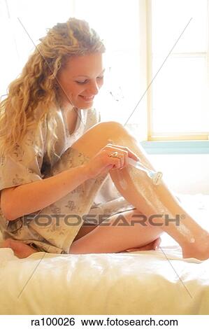 Woman shaving legs View Large Photo Image Stock Photograph - Woman shaving legs. Fotosearch
