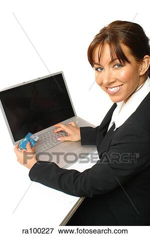 Woman sitting with laptop View Large Photo Image Stock Photo - Woman sitting with laptop. Fotosearch