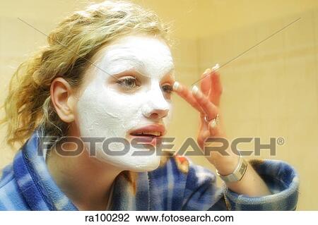 Woman with face mask View Large Photo Image Stock Image - Woman with face mask. Fotosearch