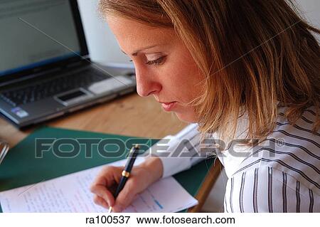 Woman writing View Large Photo Image Stock Photo - Woman writing. Fotosearch