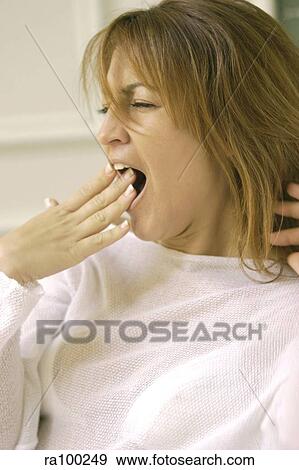 Stock Photo - Woman yawning. Fotosearch