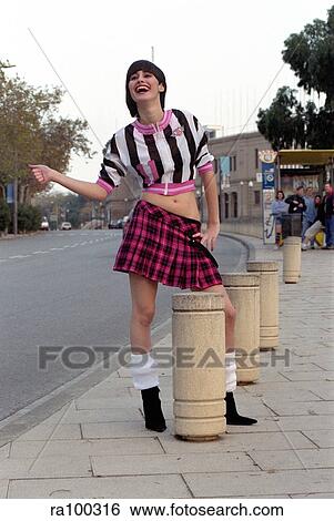 Young woman posing View Large Photo Image Stock Photograph - Young woman posing. Fotosearch