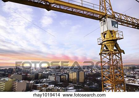 A detail of a crane overlooking the Oslo fjord and city of Oslo. View Large Photo Image Picture - A detail of a crane overlooking the Oslo fjord and city of Oslo.. Fotosearch