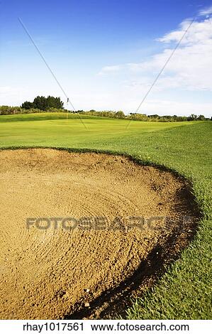 A golf sand trap on a beautiful summer day View Large Photo Image Stock Image - A golf sand trap on a beautiful summer day. Fotosearch