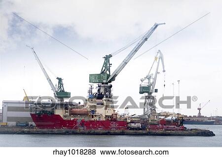 A large old transport ship being loaded. View Large Photo Image Stock Photo - A large old transport ship being loaded.. Fotosearch