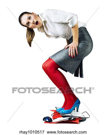 a woman trying to get her laptop stuffed with data files View Large Photo Image Stock Photo - a woman trying to get her laptop stuffed with data files. Fotosearch