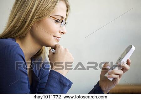attractive blond woman working from home View Large Photo Image Stock Image - attractive blond woman working from home. Fotosearch