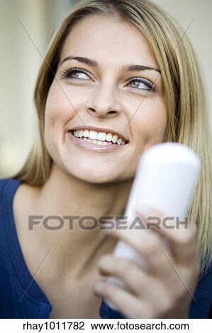 attractive blond woman working from home View Large Photo Image Stock Image - attractive blond woman working from home. Fotosearch