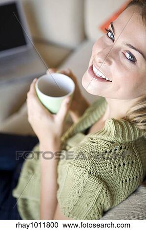 attractive blond woman working from home View Large Photo Image Stock Image - attractive blond woman working from home. Fotosearch