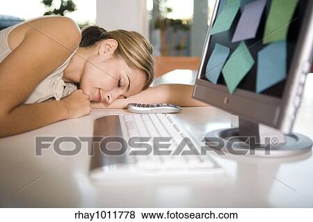 attractive blond woman working from home View Large Photo Image Stock Photo - attractive blond woman working from home. Fotosearch