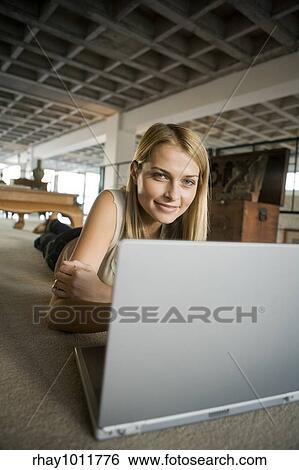 attractive blond woman working from home View Large Photo Image Stock Photograph - attractive blond woman working from home. Fotosearch