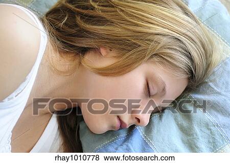 Beautiful teenage girl sleeping in the morning View Large Photo Image Stock Photo - Beautiful teenage girl sleeping in the morning. Fotosearch