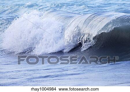 Picture - Big crashing wave in a stormy ocean. Fotosearch