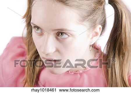 Bratty young girl with a disgusted expression on her face View Large Photo Image Stock Image - Bratty young girl with a disgusted expression on her face. Fotosearch