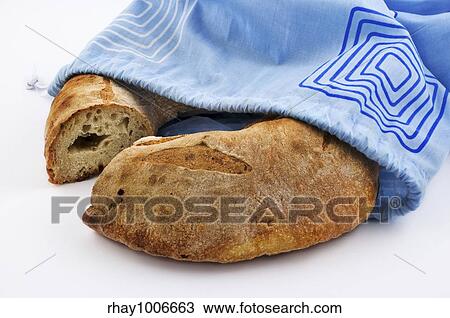 Bread loaf and blue cotton bag on white background View Large Photo Image Stock Image - Bread loaf and blue cotton bag on white background. Fotosearch