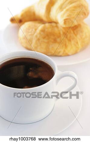 Breaksfast of black coffee and fresh croissants View Large Photo Image Stock Photo - Breaksfast of black coffee and fresh croissants. Fotosearch