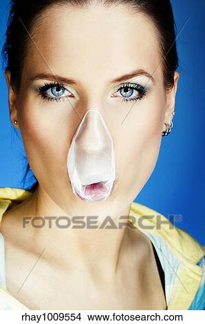 bright portrait of a woman blowing bubbles View Large Photo Image Picture - bright portrait of a woman blowing bubbles. Fotosearch