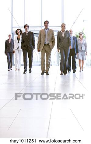 business people entering office foyer View Large Photo Image Stock Image - business people entering office foyer. Fotosearch