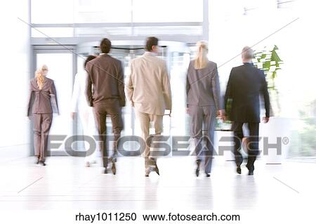 Stock Image - business people leaving office. Fotosearch
