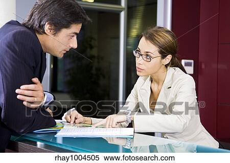 Stock Photography - businessman and secretary. Fotosearch