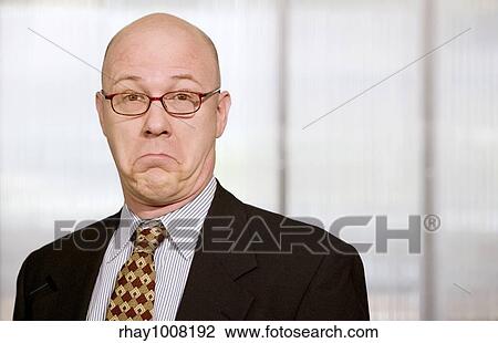 Businessman making a dramatic funny face View Large Photo Image Stock Image - Businessman making a dramatic funny face. Fotosearch