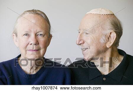 Picture - Close-up of eldery Jewish couple in studio.. Fotosearch