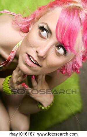 Closeup of Pretty Woman with Pink Hair on Green Rug View Large Photo Image Stock Photo - Closeup of Pretty Woman with Pink Hair on Green Rug. Fotosearch