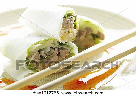 Cold spring rolls with sweet chili sauce View Large Photo Image Stock Photography - Cold spring rolls with sweet chili sauce. Fotosearch