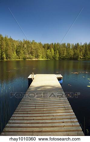 countryside lake bank with wooden pier View Large Photo Image Stock Image - countryside lake bank with wooden pier. Fotosearch