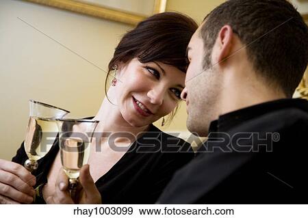 couple toasting View Large Photo Image Stock Photo - couple toasting. Fotosearch