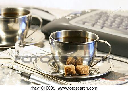 Cups of coffee ready for a quiet break from work View Large Photo Image Stock Photography - Cups of coffee ready for a quiet break from work. Fotosearch