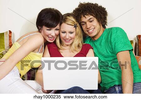 domestic life: three friends studying at home View Large Photo Image Stock Photography - domestic life: three friends studying at home. Fotosearch
