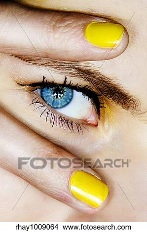 extreme close up of a female eye with disco spread fingers move View Large Photo Image Picture - extreme close up of a female eye with disco spread fingers move. Fotosearch