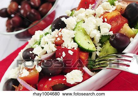 Greek salad with feta cheese and black kalamata olives View Large Photo Image Stock Image - Greek salad with feta cheese and black kalamata olives. Fotosearch