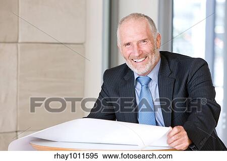 Stock Photography - greying businessman. Fotosearch