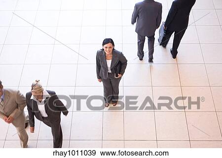 Stock Photo - group of business people shot from above. Fotosearch