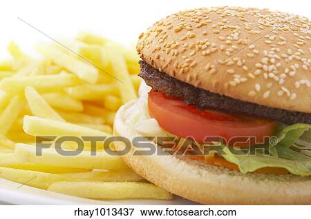hamburger and french fries on the plate over white background View Large Photo Image Stock Photo - hamburger and french fries on the plate over white background. Fotosearch
