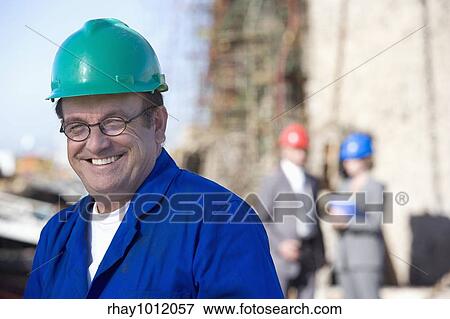 hard hats & heavy industry View Large Photo Image Stock Photo - hard hats & heavy industry. Fotosearch