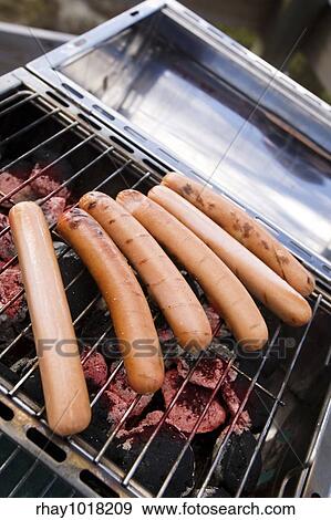 hotdogs on a barbeque View Large Photo Image Stock Photo - hotdogs on a barbeque. Fotosearch