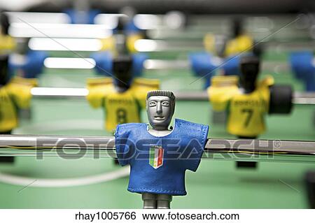 Image of desktop football with plastic players in the dark blue and yellow form close up on a green backgroundImage of desktop football with plastic players in the dark blue and yellow form close... View Large Photo Image Stock Photograph - Image of desktop football with plastic players in the dark blue and yellow form close up on a green backgroundImage of desktop football with plastic players in the dark blue and yellow form close.... Fotosearch