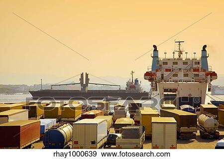 industry and commerce: trucks parked in a harbor View Large Photo Image Stock Photo - industry and commerce: trucks parked in a harbor . Fotosearch