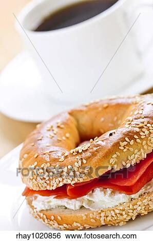 Light meal of smoked salmon bagel and coffee View Large Photo Image Stock Photograph - Light meal of smoked salmon bagel and coffee. Fotosearch
