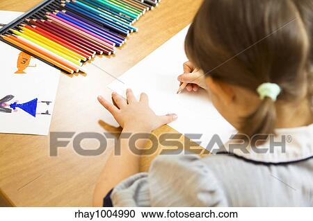 little girl playing with colors. The focus is on the hand drawing View Large Photo Image Stock Image - little girl playing with colors. The focus is on the hand drawing. Fotosearch