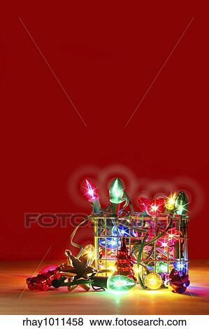 Metal basket filled with lights for decorating View Large Photo Image Stock Photo - Metal basket filled with lights for decorating. Fotosearch