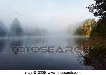 Morning mist along the river View Large Photo Image Stock Photograph - Morning mist along the river. Fotosearch