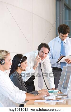 office scene with telephonist View Large Photo Image Stock Image - office scene with telephonist. Fotosearch